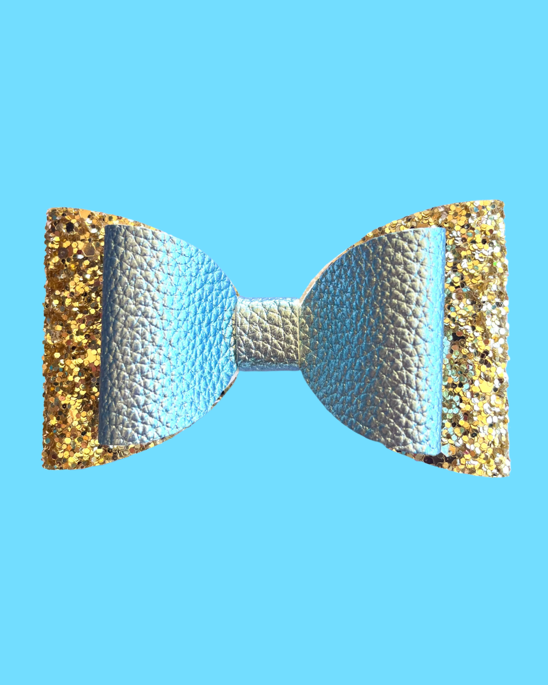 The Daydream hair bow for kids. Pearl blue and gold glitter hair bow for girls.