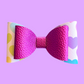 The Sweetheart hair bow. Pink and heart patterned bow.