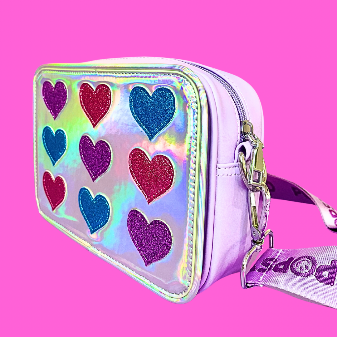 Side view of glitter hearts kids crossbody bag