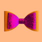 Sunset hair bow for kids. 2 layered bow with pink glitter and shiny orange. 