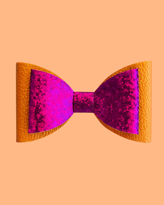 Sunset hair bow for kids. 2 layered bow with pink glitter and shiny orange. 